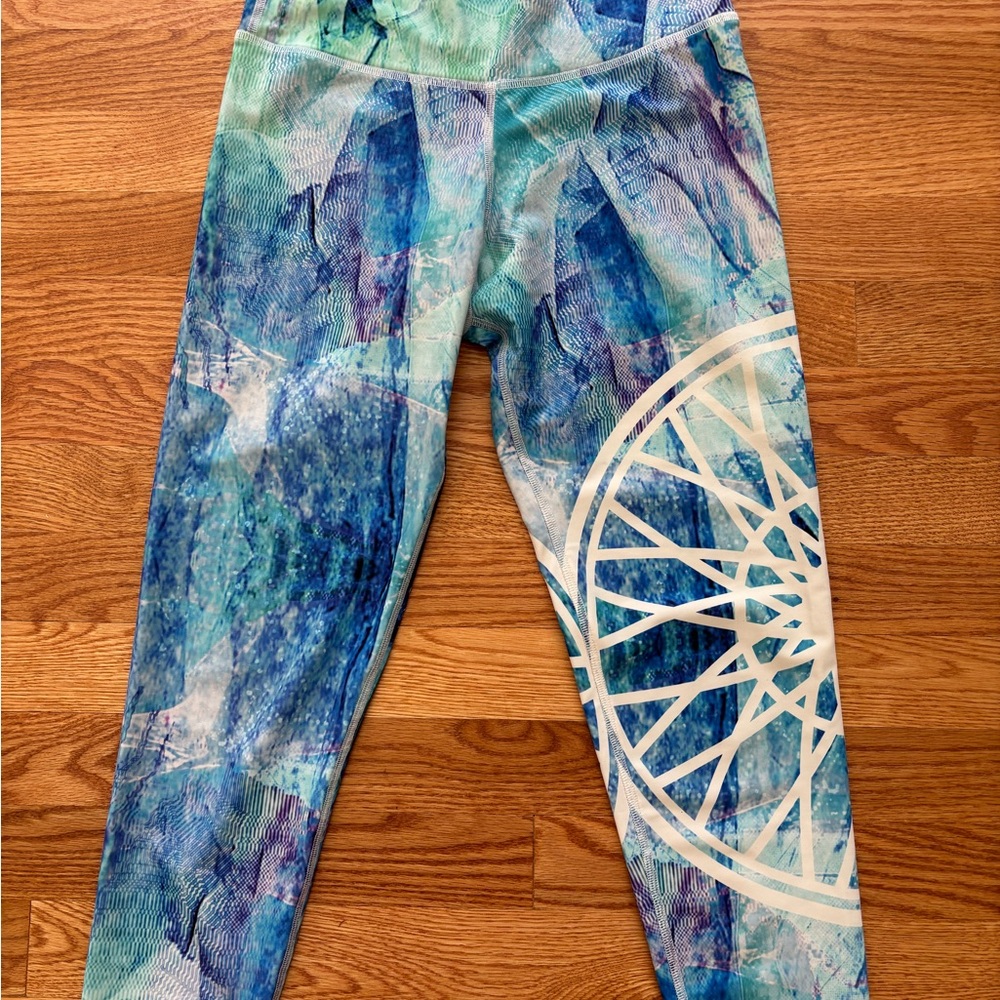 SoulCycle Blue Watercolor Print Leggings with White Wheel Accent